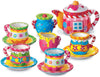 Colorful children's tea set with teapot, cups, and saucers on a white background
